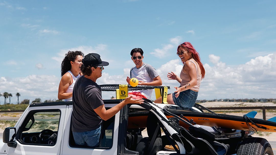 Exciting Spikeball game on a pickup truck